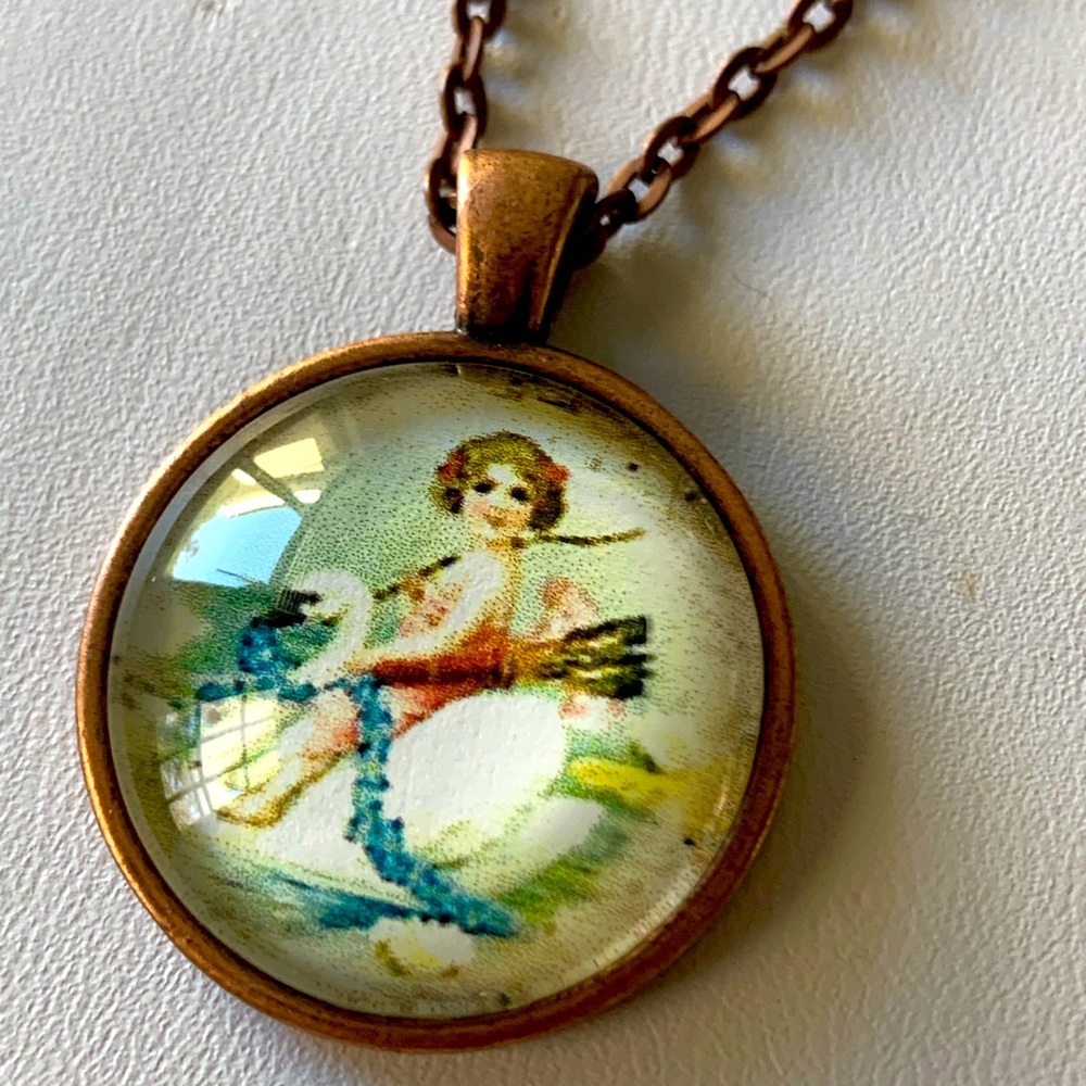 Necklace cherub and swan